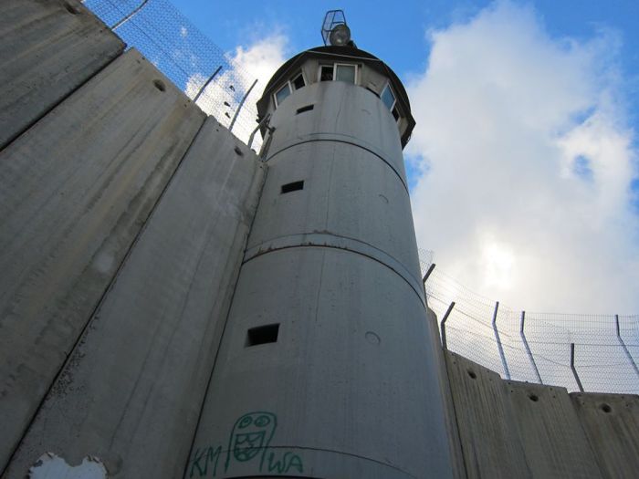 “The Open Air Prison”: Watchtower and apartheid wall, Bethlehem, Palestine.